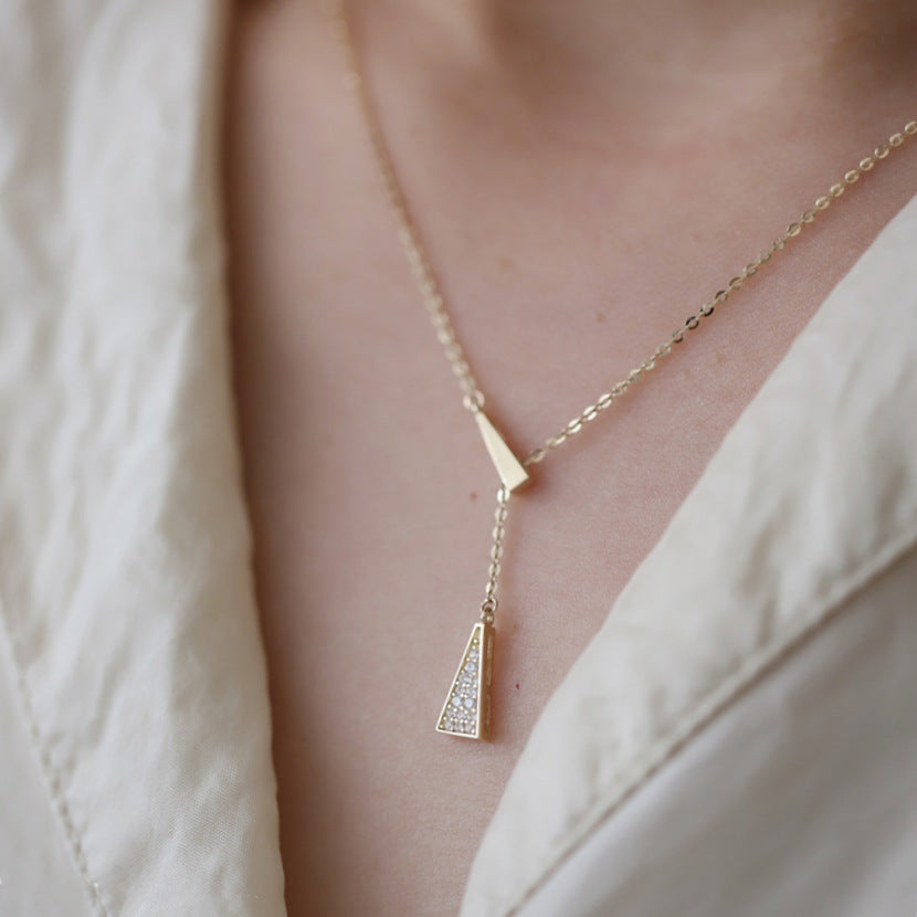 Sterling silver triangle necklace plated in 14k gold with AAA+ zirconium.