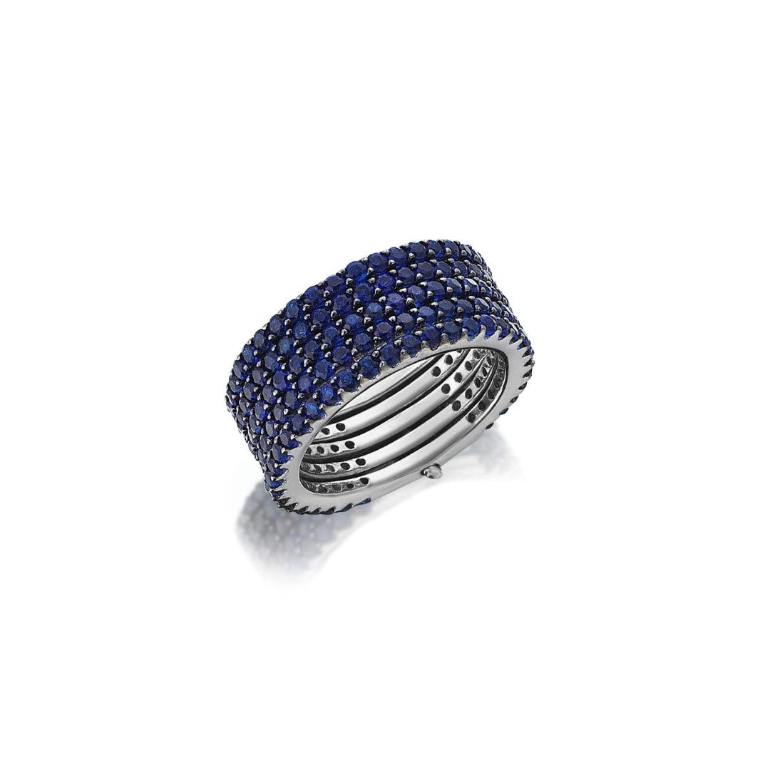 Sterling silver rhodium-plated BAGUE OLYMPIA ring with sapphire blue stones.